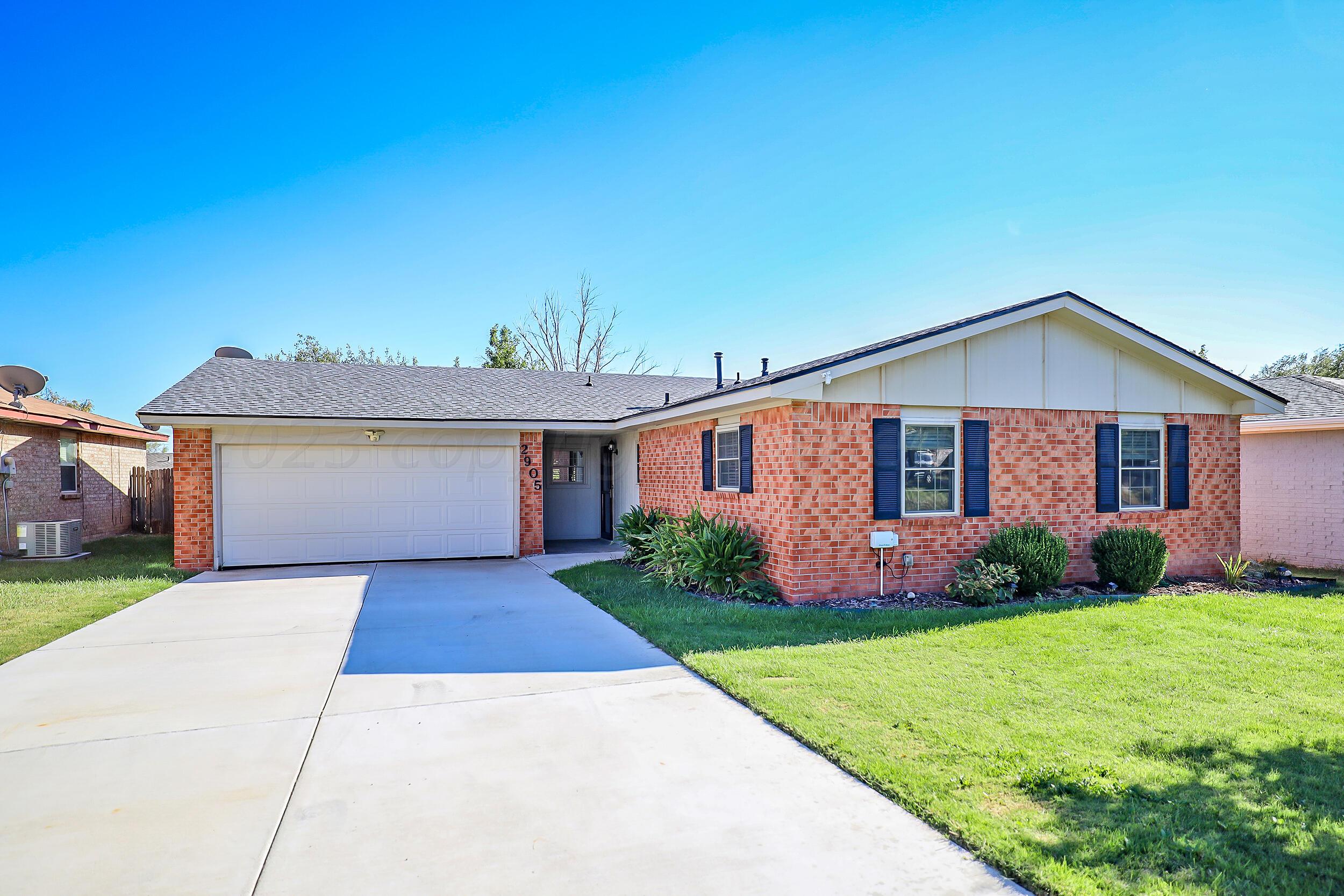 2905 Salem Drive Amarillo, TX 79110 - Photo 1 of 29 a front view of house with yard and green space