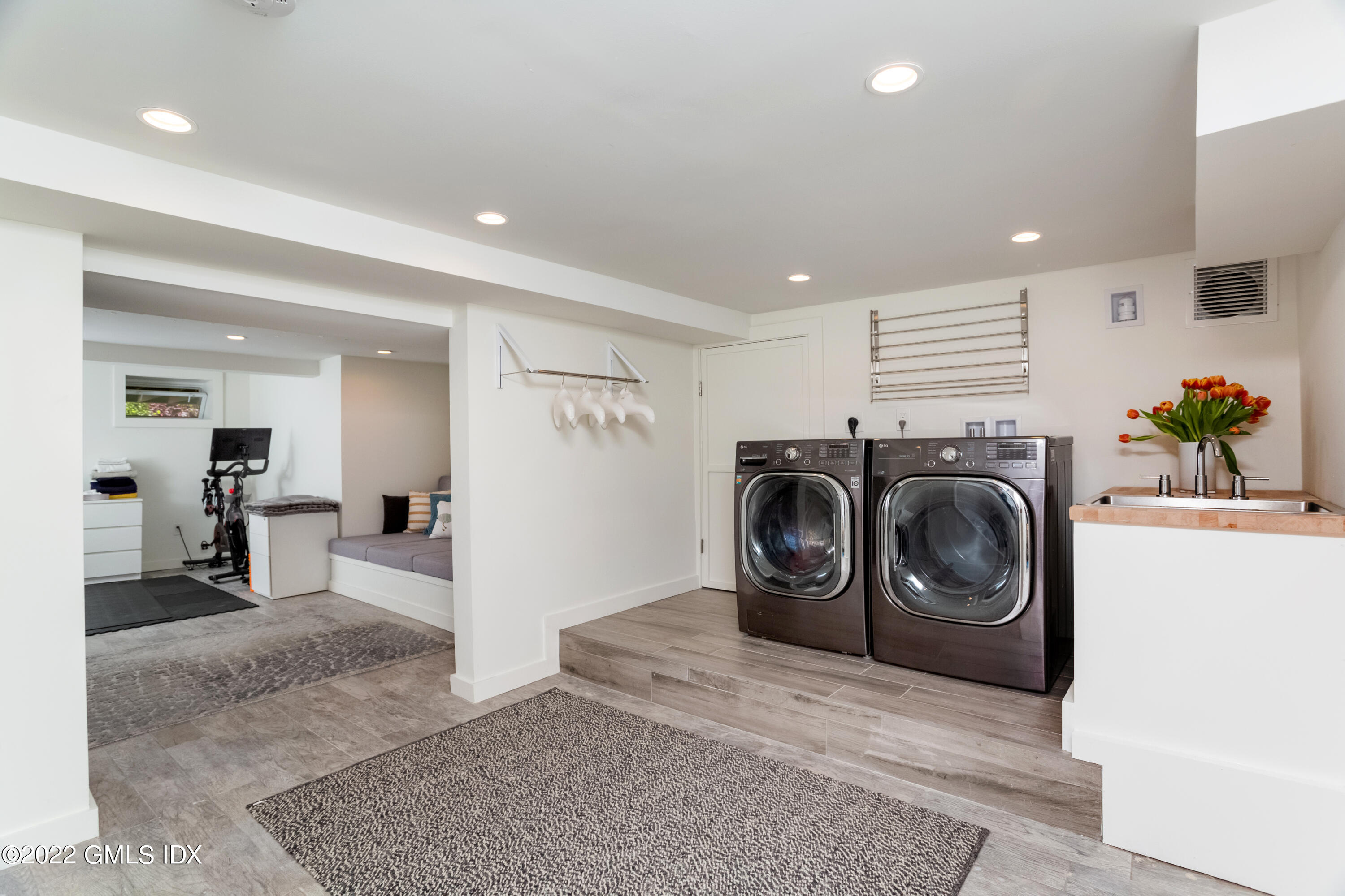 6 Chapel Lane Riverside, CT 06878 - Photo 23 of 29 a view of a hallway with washer and dryer