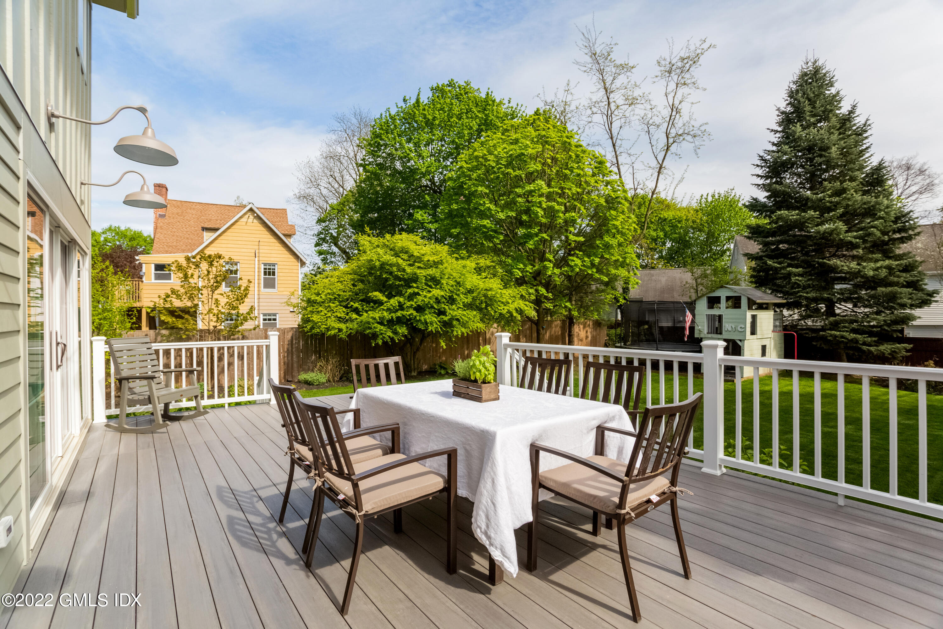 6 Chapel Lane Riverside, CT 06878 - Photo 25 of 29 a view of a deck patio and outdoor seating