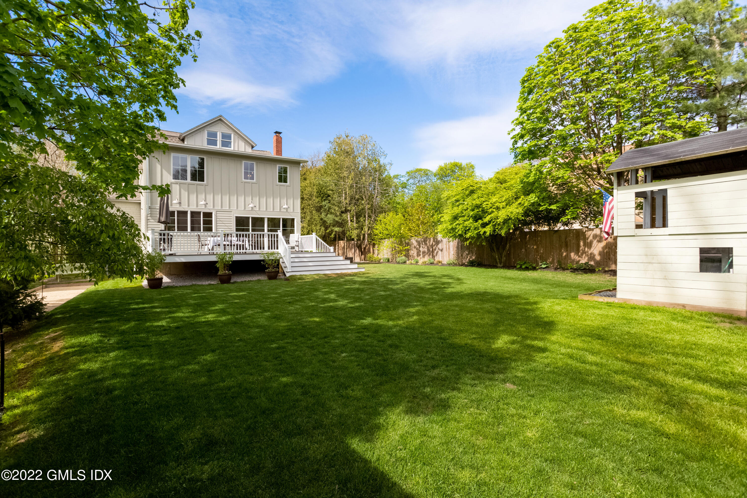 6 Chapel Lane Riverside, CT 06878 - Photo 27 of 29 a front view of a house with a yard