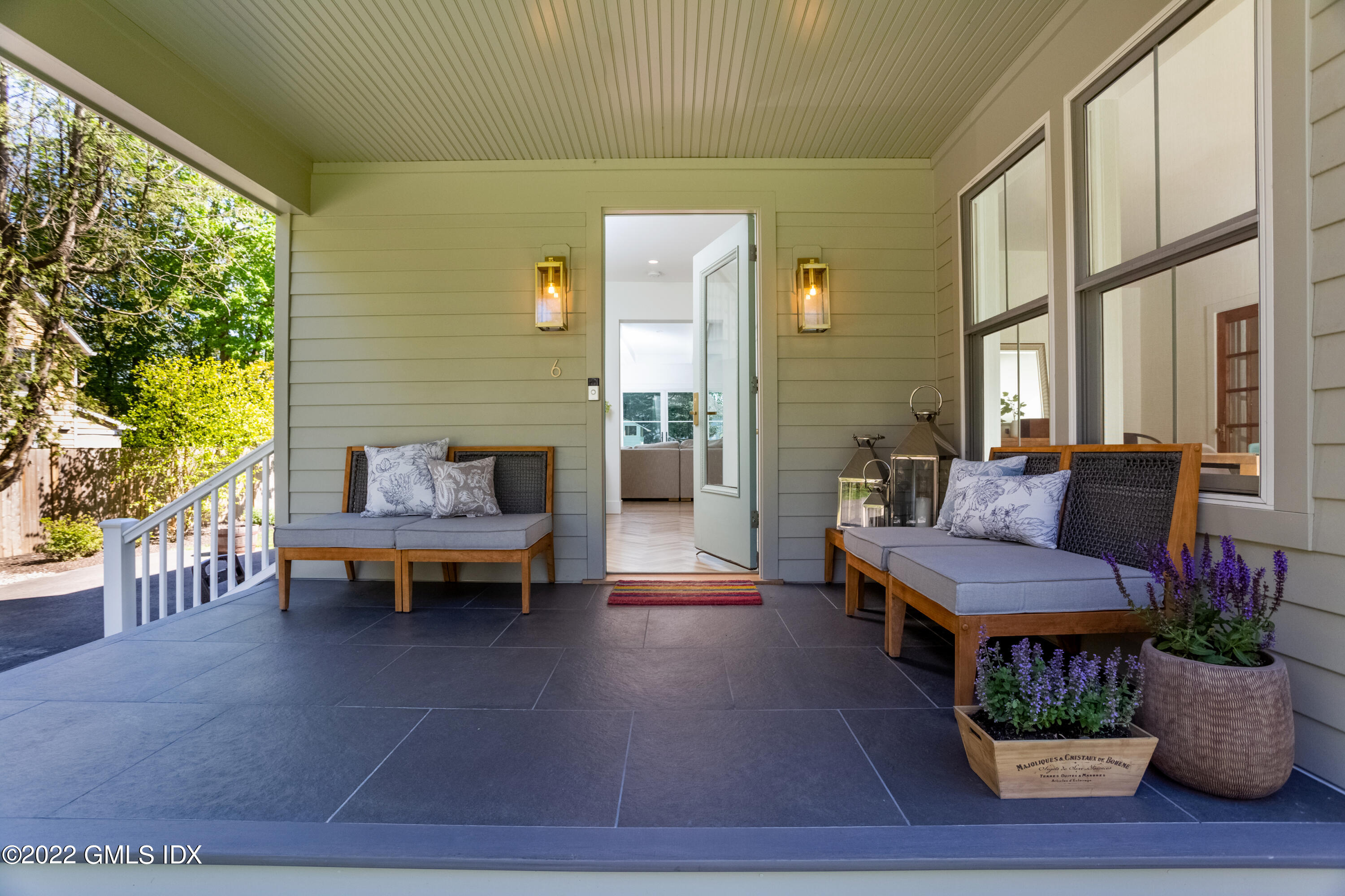 6 Chapel Lane Riverside, CT 06878 - Photo 3 of 29 a outdoor living space with furniture and a potted plant