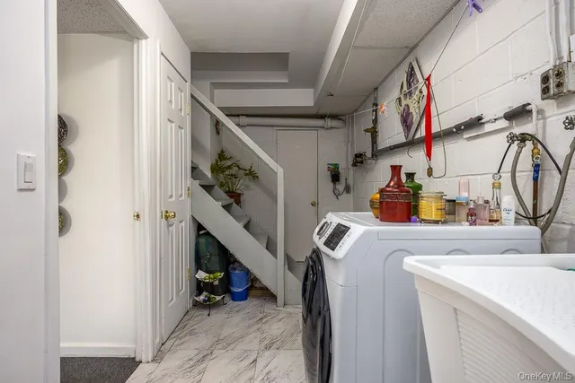 a utility room with dryer and washer