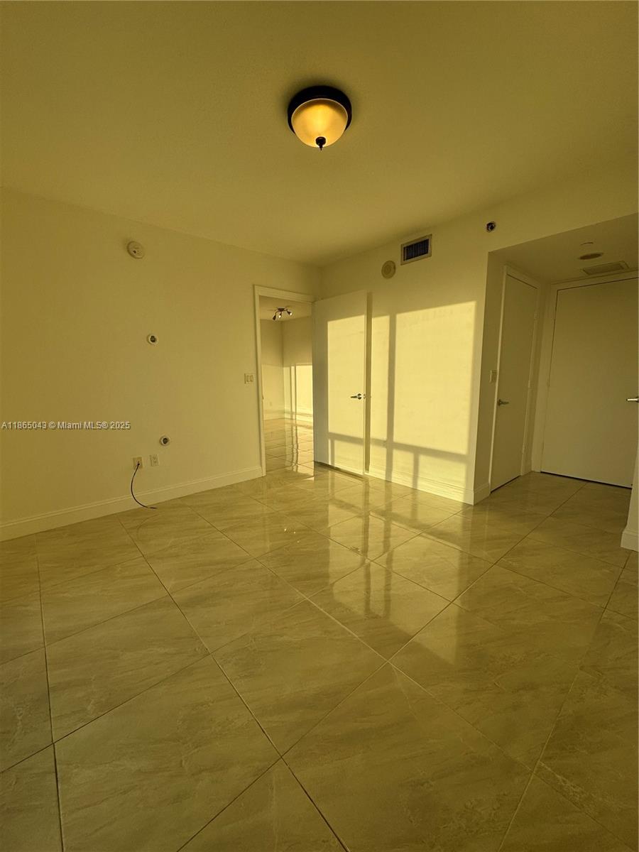 50 Biscayne Boulevard, Unit 3405 Miami, FL 33132 - Photo 15 of 40 a view of an empty room