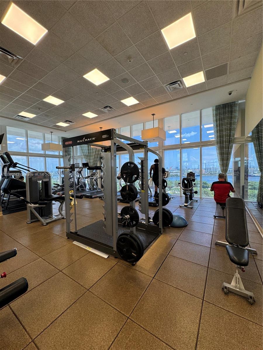 50 Biscayne Boulevard, Unit 3405 Miami, FL 33132 - Photo 29 of 40 a view of a room with gym equipment