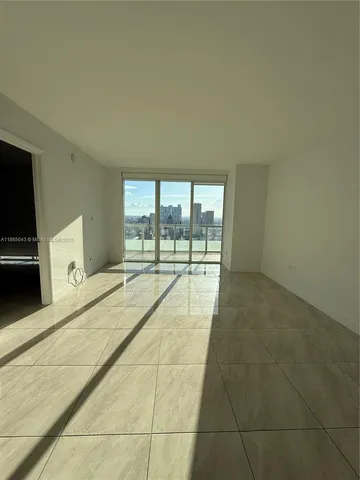 a swimming pool with a large window