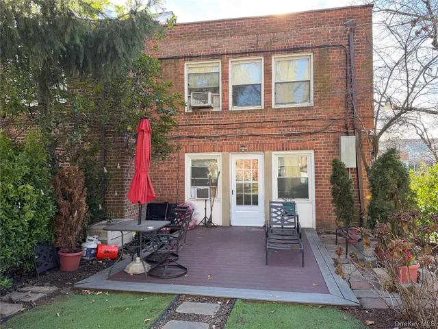 a house view with a seating space and garden