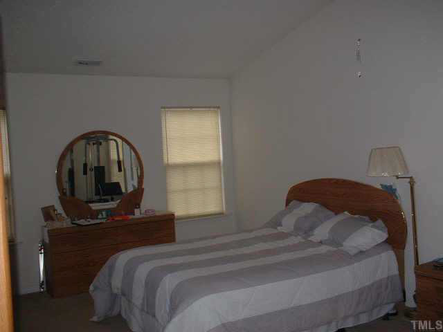 7413 Lowell Ridge Road Raleigh, NC 27616 - Photo 7 of 10 Master Bedroom, Vailted Ceiling, Private Bath, WIC Other