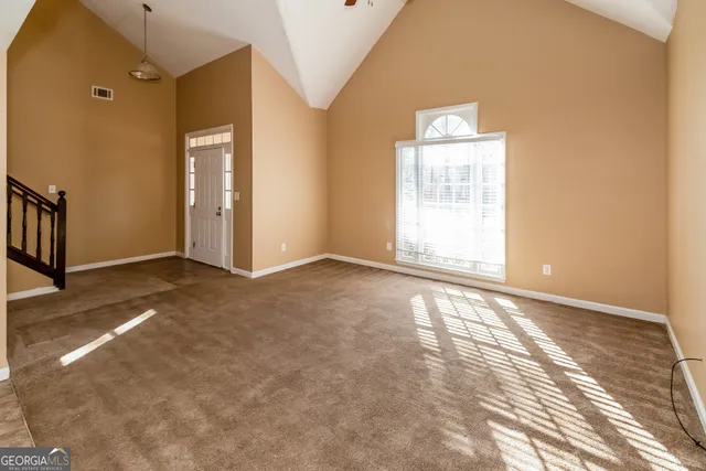 an empty room with windows