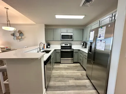 a view of a balcony with chairs
