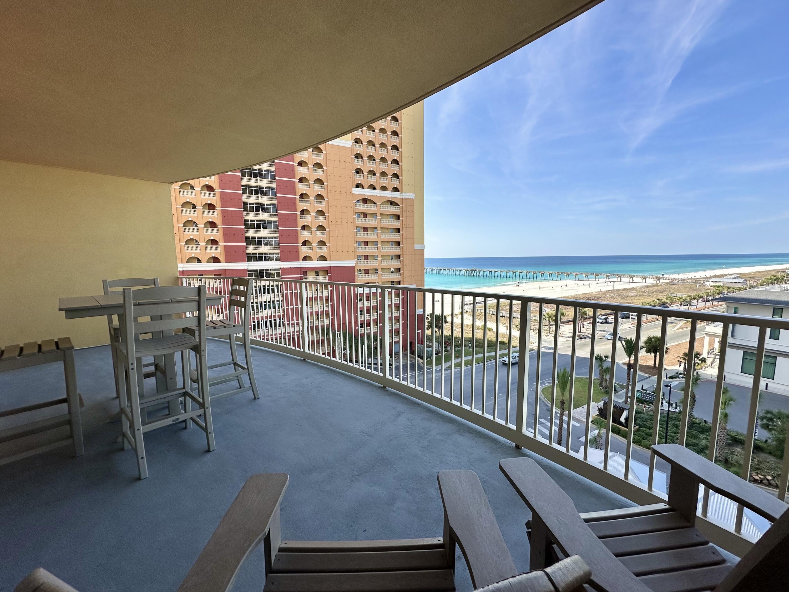 15928 Front Beach Road, Unit 3702 Panama City Beach, FL 32413 - Photo 20 of 85 a view of a balcony with chairs