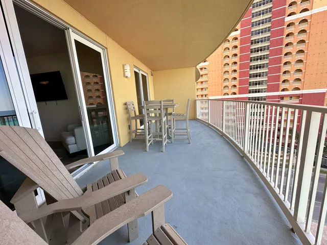 a view of a balcony with an outdoor space