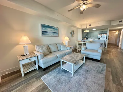a bathroom with a sink vanity granite and toilet