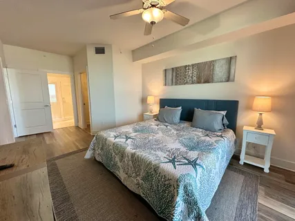 a front view of a house with entryway and wooden floor