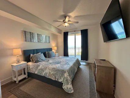 a view of a lake with houses in the back