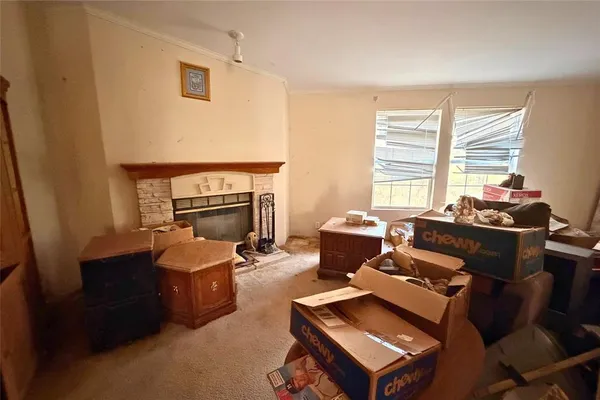 a very nice looking dining room with a large window and chairs
