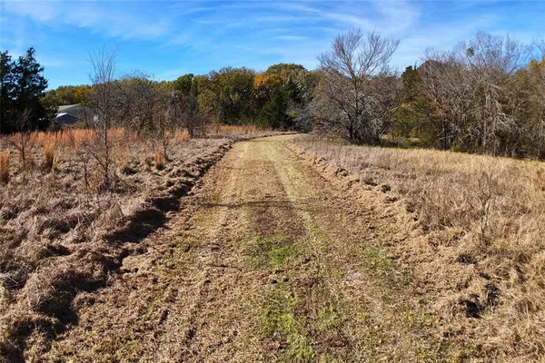 a view of a covered with snow on the road