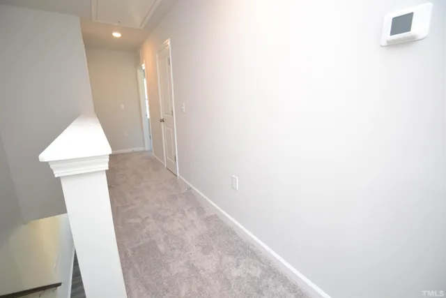 a view of hallway with washer and dryer
