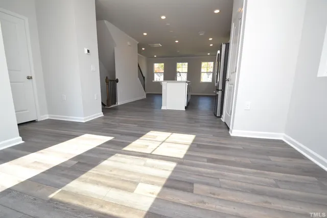a view of entryway with wooden floor