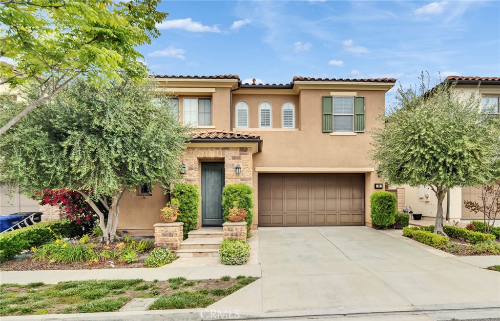 23 Snapdragon Lake Forest, CA 92630 - Photo 1 of 1 a front view of a house with garden