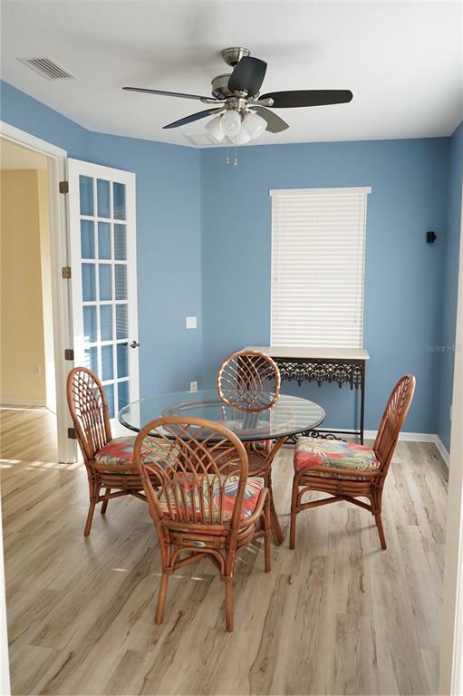 201 Sunset Crest Court Apollo Beach, FL 33572 - Photo 18 of 81 a chair and a table in a room