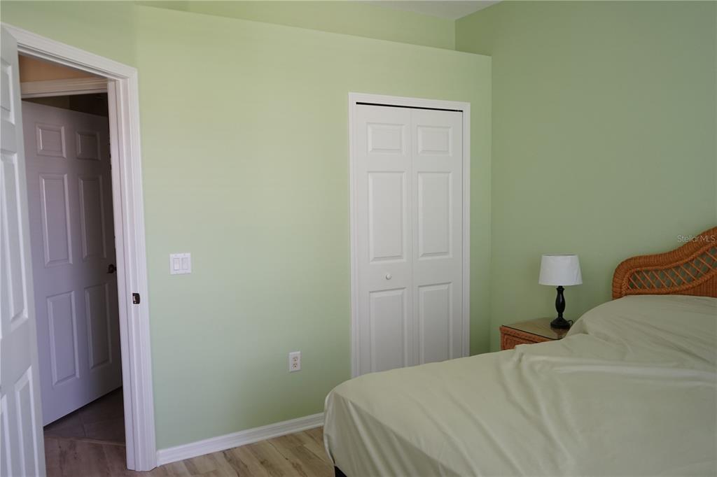 201 Sunset Crest Court Apollo Beach, FL 33572 - Photo 44 of 81 a bedroom with a bed and a closet