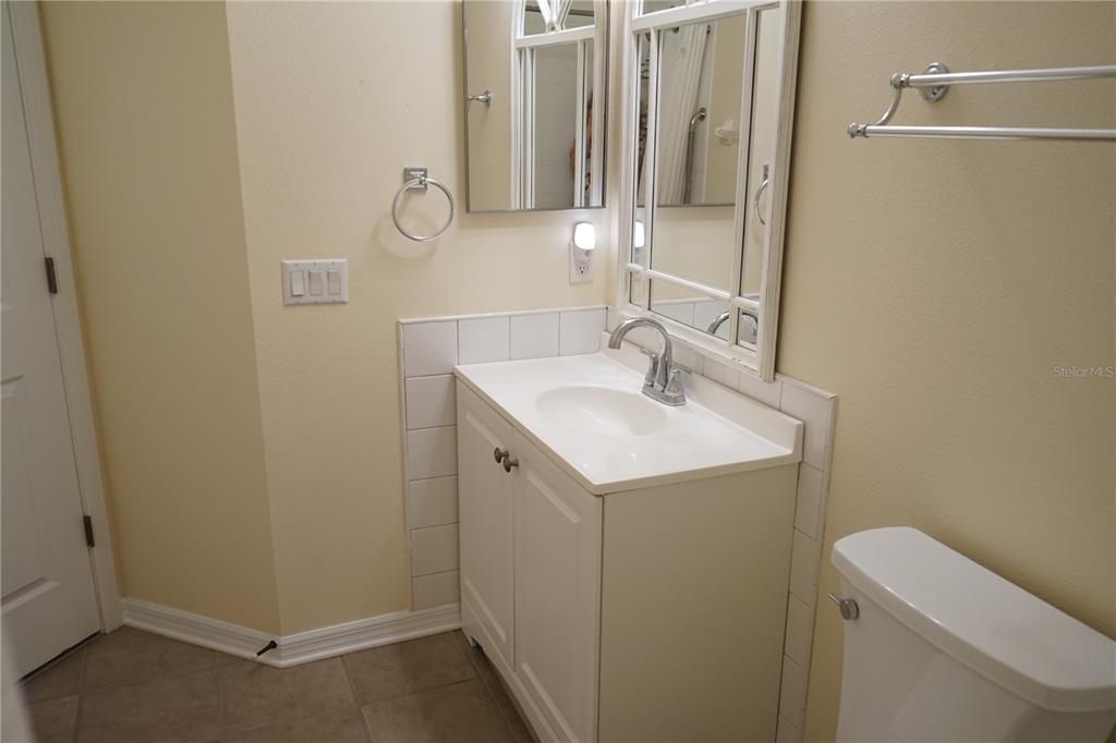 201 Sunset Crest Court Apollo Beach, FL 33572 - Photo 47 of 81 a bathroom with a sink and a mirror