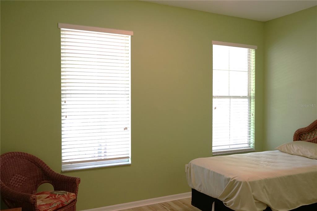 201 Sunset Crest Court Apollo Beach, FL 33572 - Photo 50 of 81 a bedroom with a bed and a window
