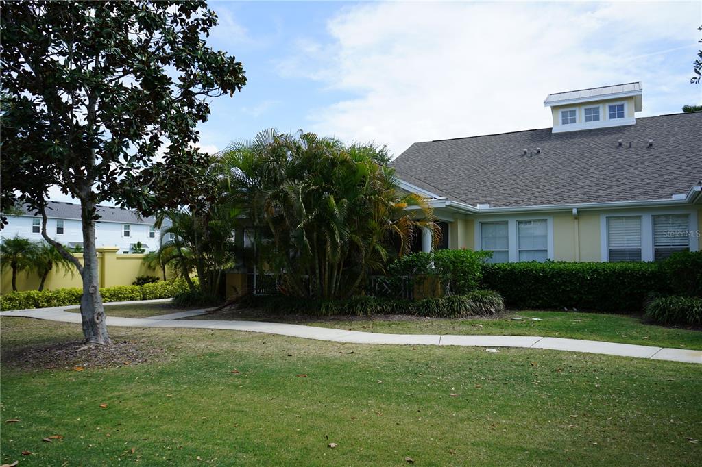 201 Sunset Crest Court Apollo Beach, FL 33572 - Photo 59 of 81 a front view of a house with a yard and trees