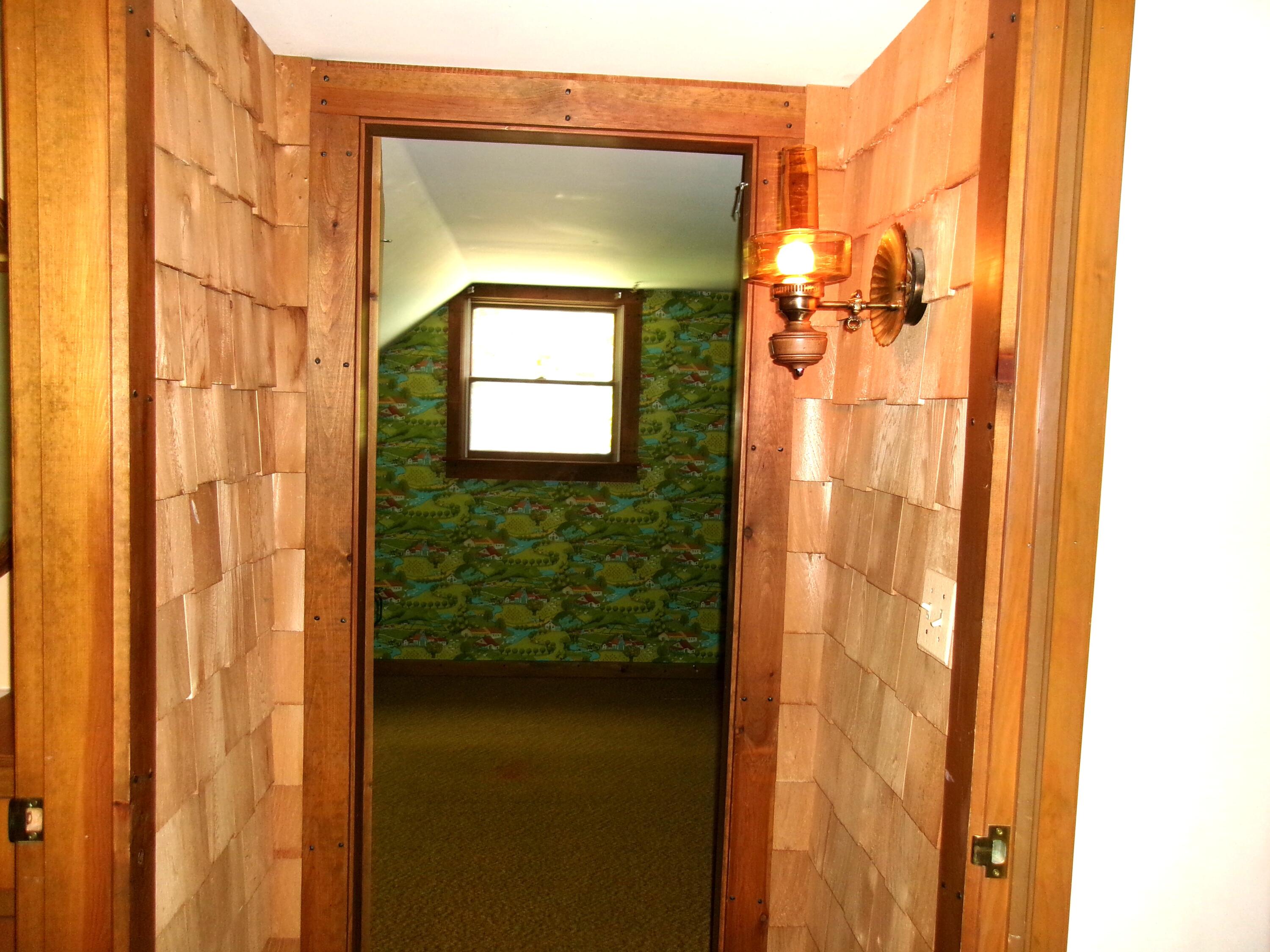 218 Bowdoinham Road Lisbon, ME 04252 - Photo 34 of 55 Cedar Shakes in the hall.