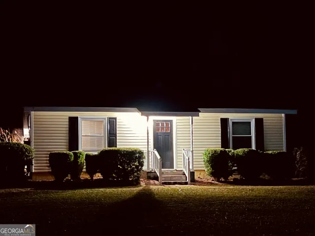 a view of a house with a patio