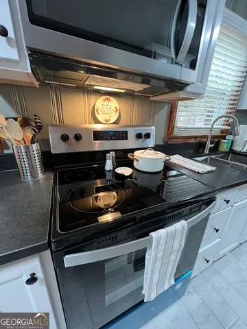 a utility room with washer and dryer