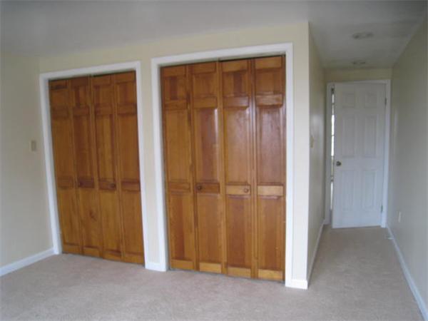 95 Bay Road, Unit A Revere, MA 02151 - Photo 10 of 12 an empty room with closet and closet area