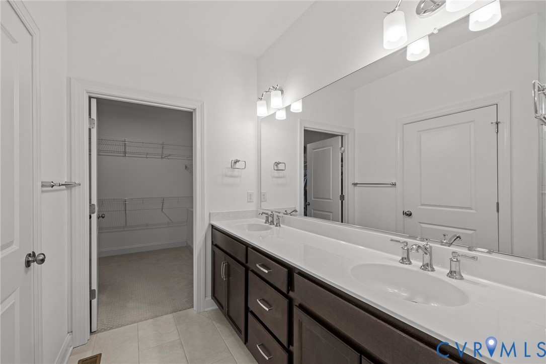 224 Lauradell Road Ashland, VA 23005 - Photo 29 of 74 Bathroom featuring a double vanity with dark wood