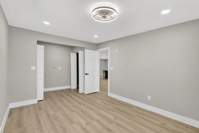 an empty room with windows