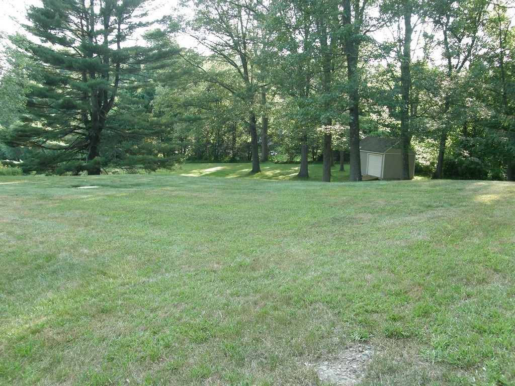 5 Corbin Road Dudley, MA 01571 - Photo 26 of 30 a big yard with lots of green space and trees