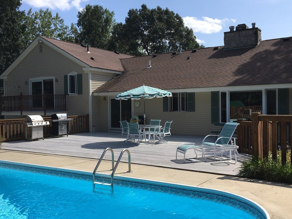 5 Corbin Road Dudley, MA 01571 - Photo 27 of 30 a view of house with yard outdoor seating and swimming pool