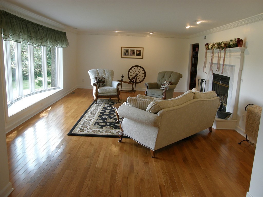 5 Corbin Road Dudley, MA 01571 - Photo 9 of 30 a living room with furniture and a large window