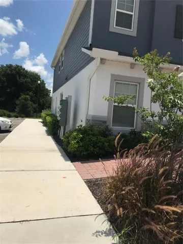 a view of a back yard of the house