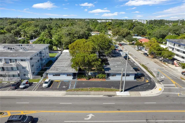 a view of a kitchen with a sink