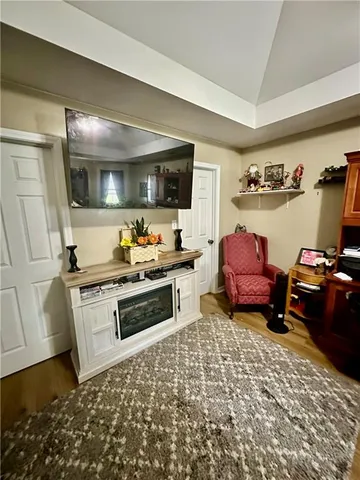 a kitchen with stainless steel appliances a stove a sink and a refrigerator