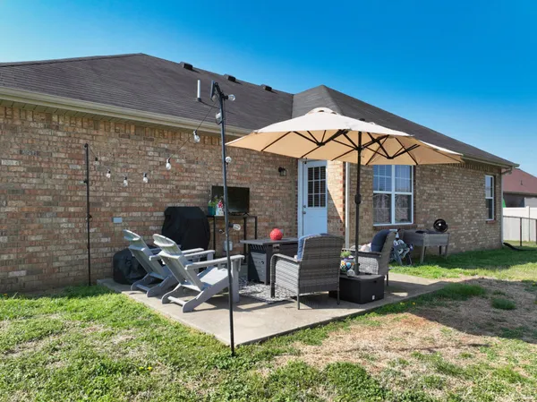 a building outdoor space with patio furniture