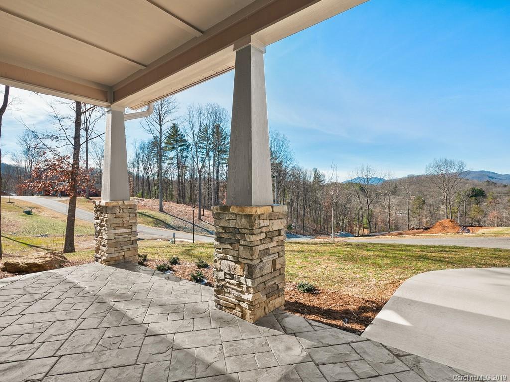 28 Jasper Ridge Clyde, NC 28721 - Photo 3 of 24 a view of a swimming pool with a patio
