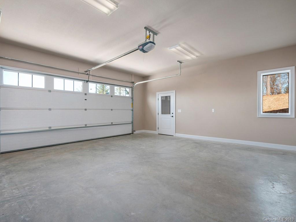 28 Jasper Ridge Clyde, NC 28721 - Photo 21 of 24 a view of an empty room with a window