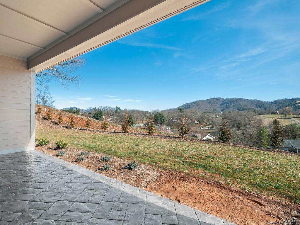 28 Jasper Ridge Clyde, NC 28721 - Photo 22 of 24 a view of a yard with an outdoor space