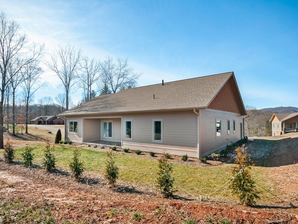 28 Jasper Ridge Clyde, NC 28721 - Photo 23 of 24 a front view of a house with a yard