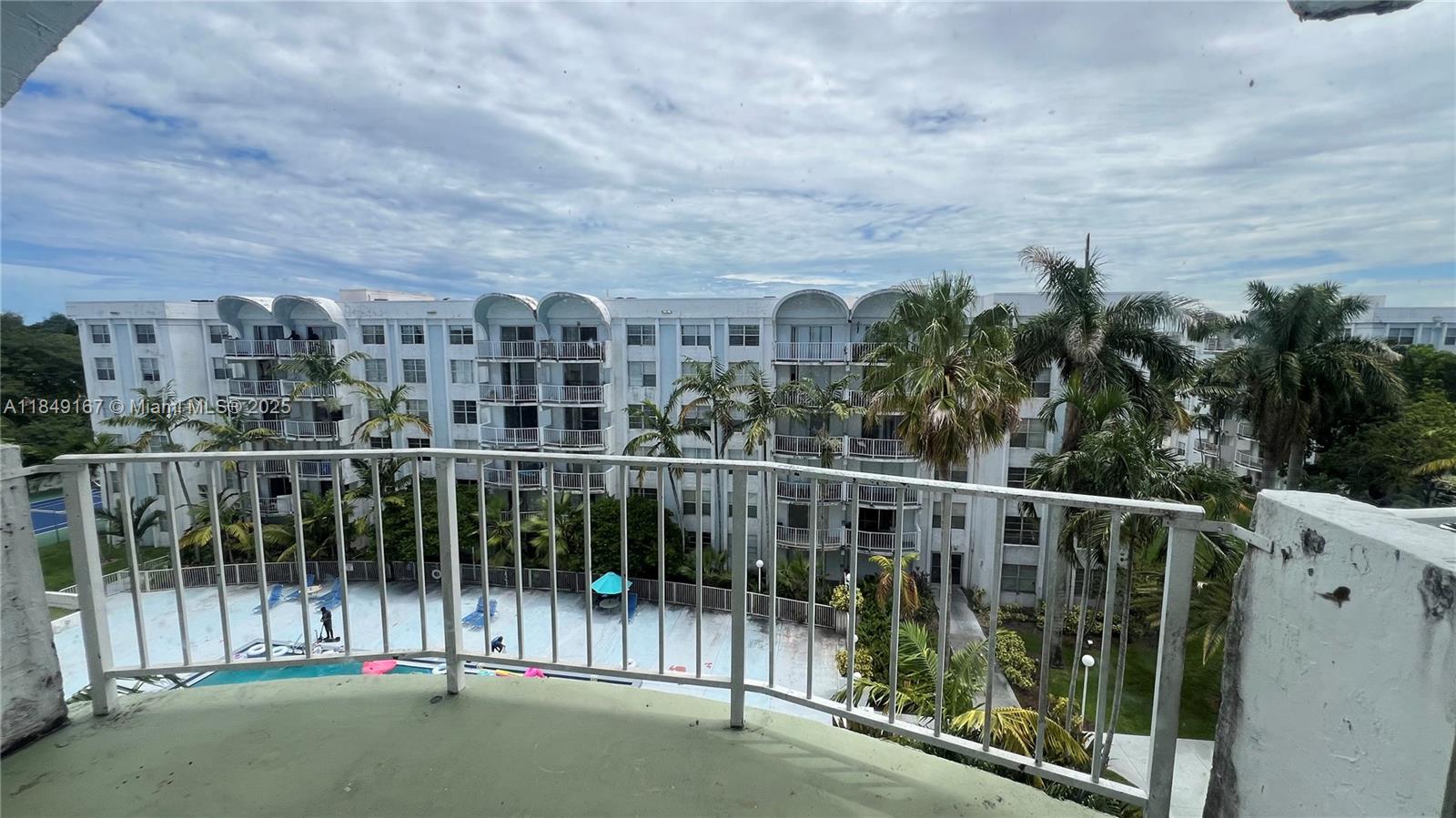 486 Northwest 165th Street, Unit B606 Miami, FL 33169 - Photo 6 of 19 a view of a city from a balcony