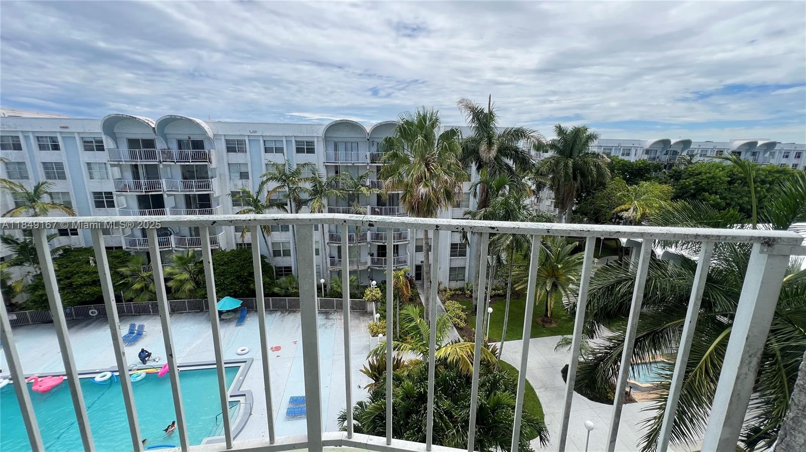 486 Northwest 165th Street, Unit B606 Miami, FL 33169 - Photo 7 of 19 a view of a city from a balcony