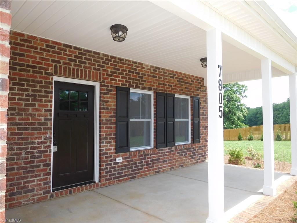 7805 Grapevine Road Lewisville, NC 27023 - Photo 3 of 45 ALL BRICK 2 STORY HOME W/COVERED FRONT PORCH. BRING YOUR ROCKING CHAIRS!