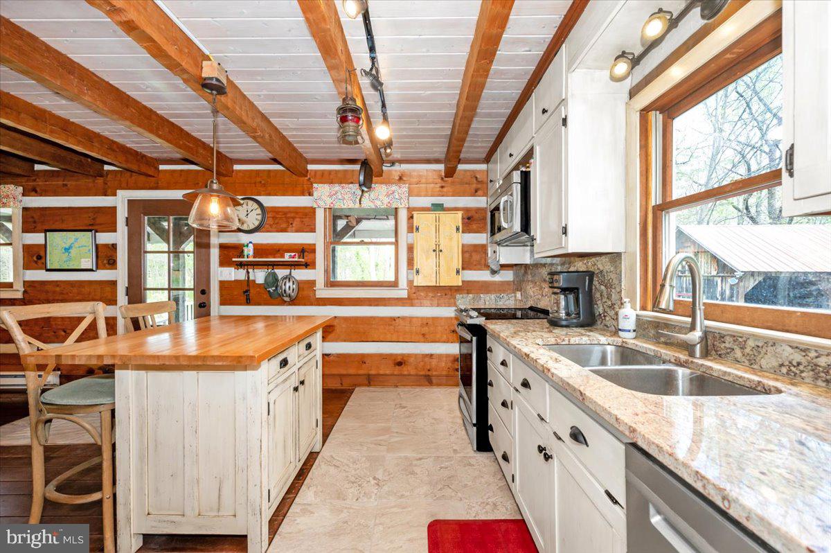 16926 Sprecher Road Sharpsburg, MD 21782 - Photo 17 of 76 Charming rustic kitchen with modern flair.