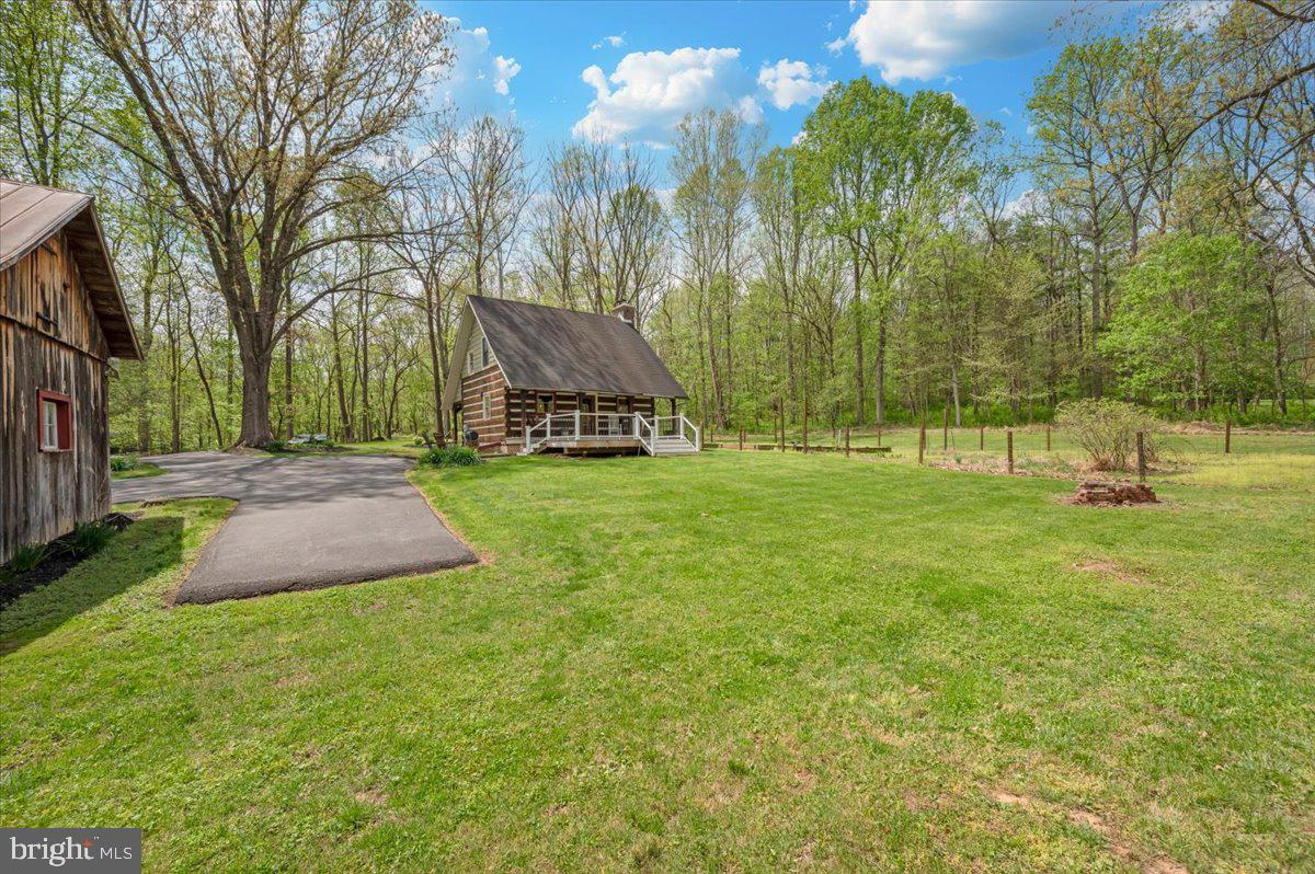 16926 Sprecher Road Sharpsburg, MD 21782 - Photo 51 of 76 Charming cabin nestled in nature's embrace.